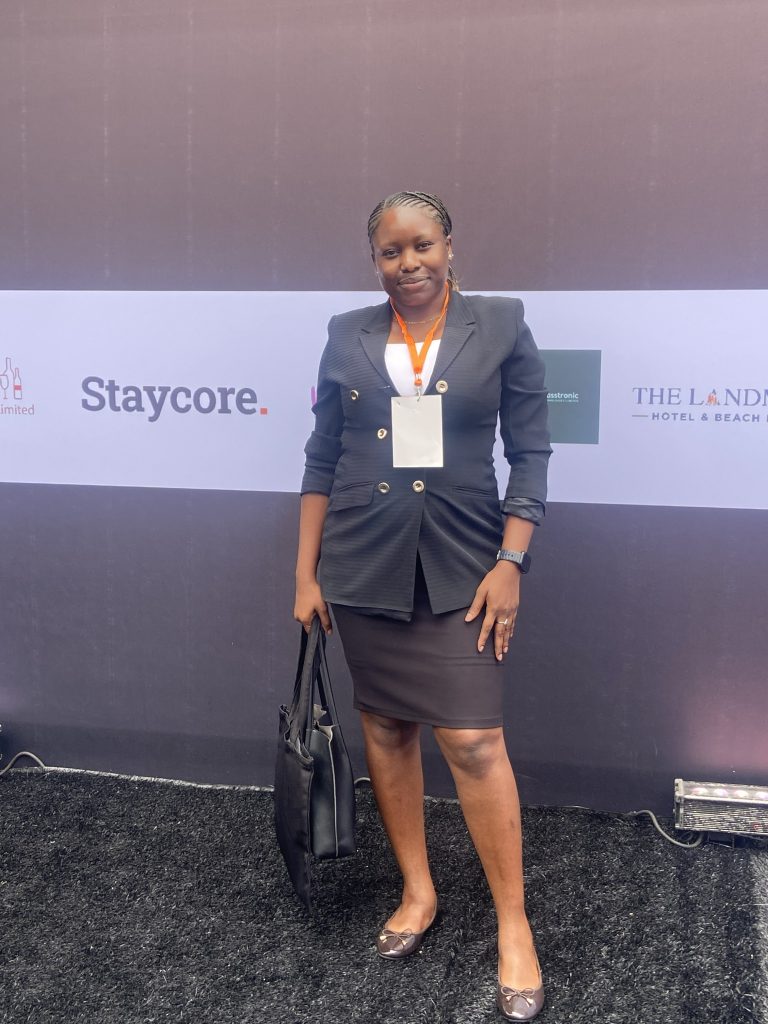Sharma Jordans of LibraX at the Hotel Expo Nigeria 2026 partner backdrop, Landmark Event Centre, Lagos